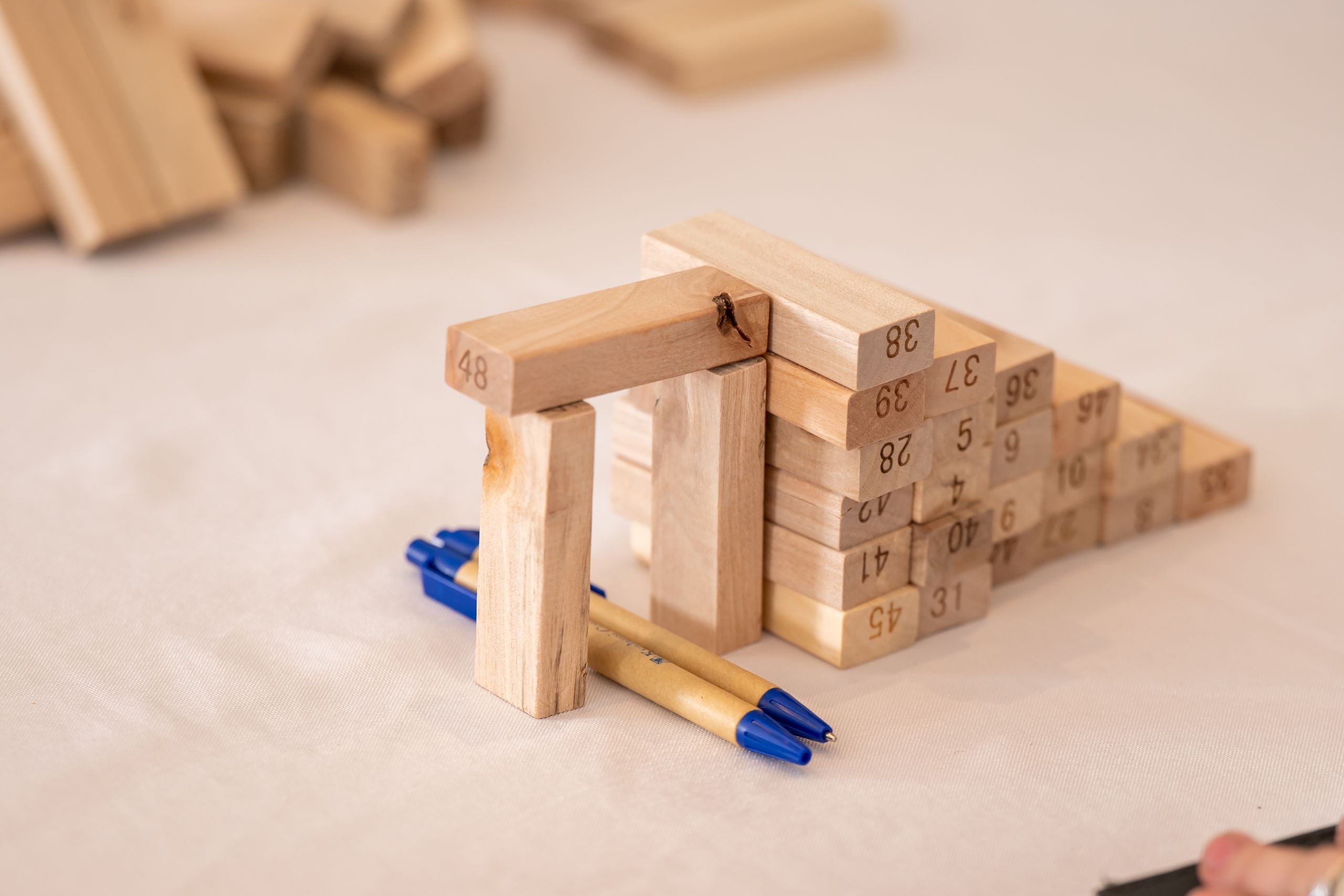 stacked blocks with pen underneath