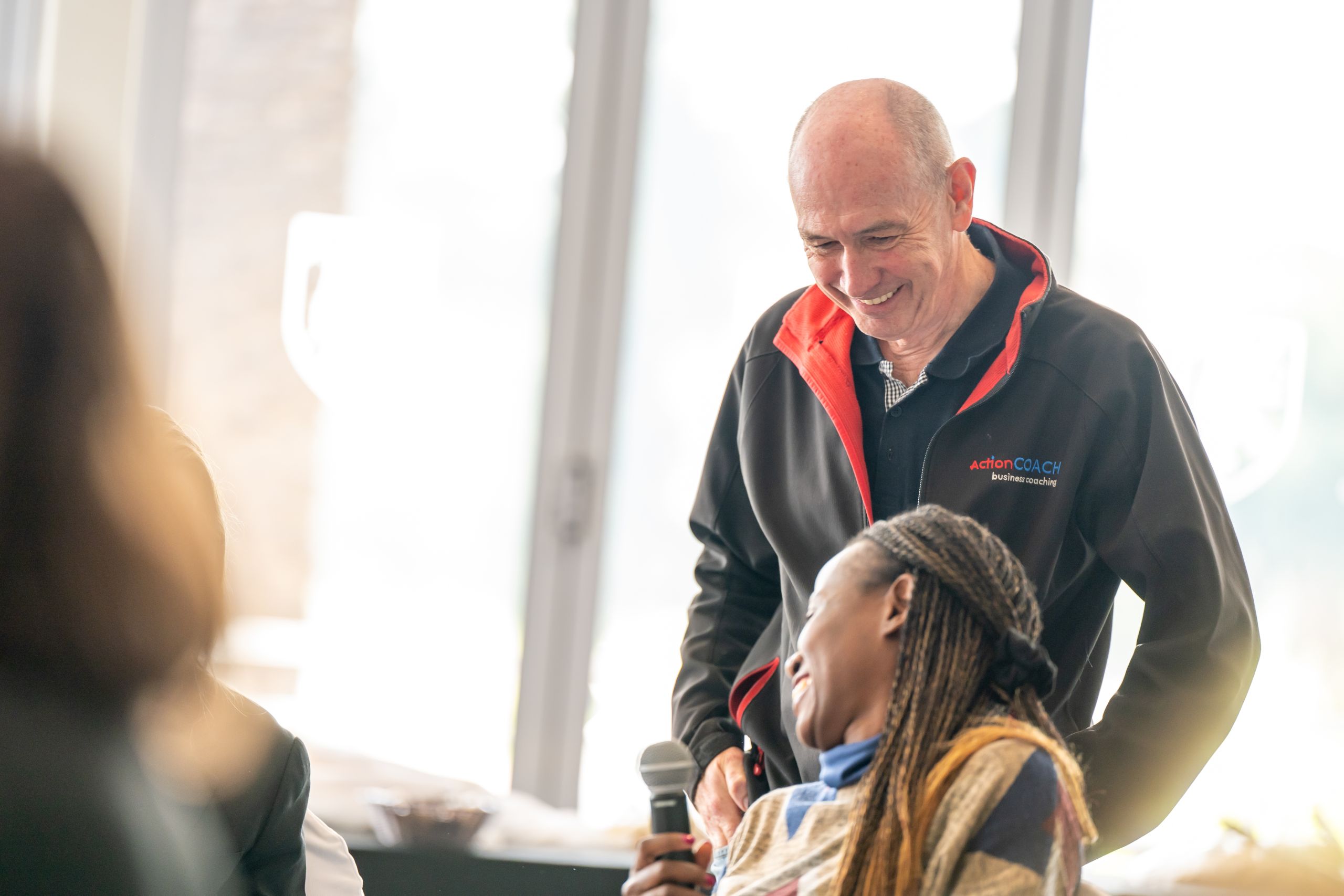 DSC_6396 an ActionCOACH talking to a client